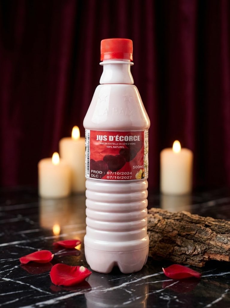 Bouteille de jus d’écorce Atote 500 ml de face, ambiance boudoir aux bougies